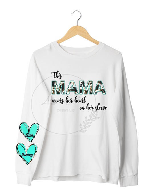 This mama, grandma, abuela wears her heart on her sleeve long sleeve shirt personalized